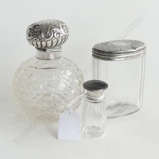 SCENT BOTTLE THE LID HAS BEEN DAMAGED