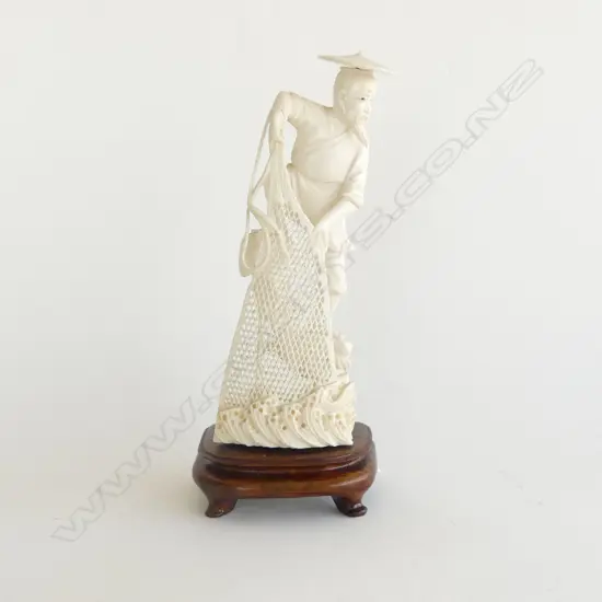 A Chinese carved ivory figure,