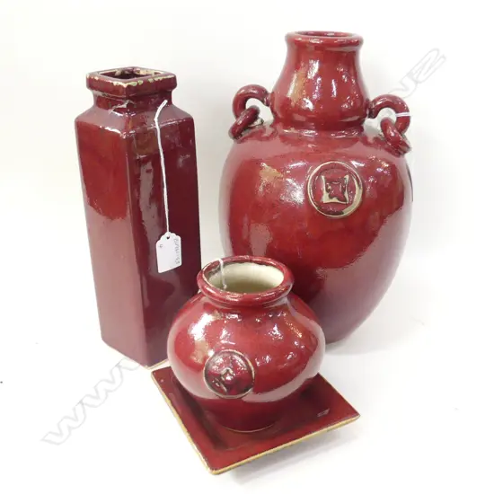 THREE RED POTTERY VASES OF VARIOUS SHAPES AND A SMALL PLATE