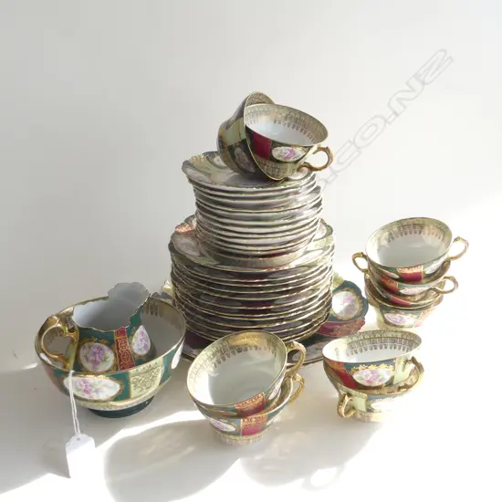 GERMAN KAUFMAN STYLE TEASET; 11 TRIOS, 2 LG CAKE PLATES, SUGAR BOWL & JUG + SPARE PLATE & SAUCER