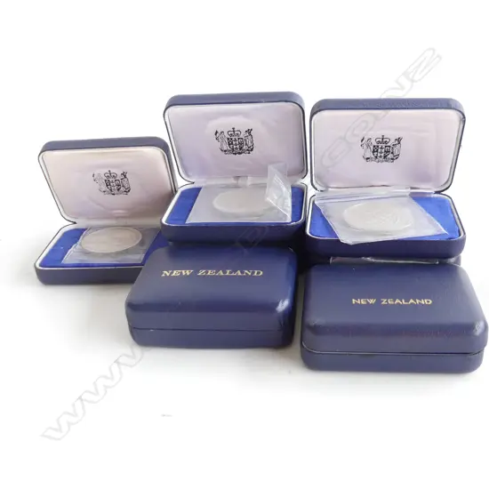 7 NZ 1970s ONE DOLLAR UNC. COINS, CASED