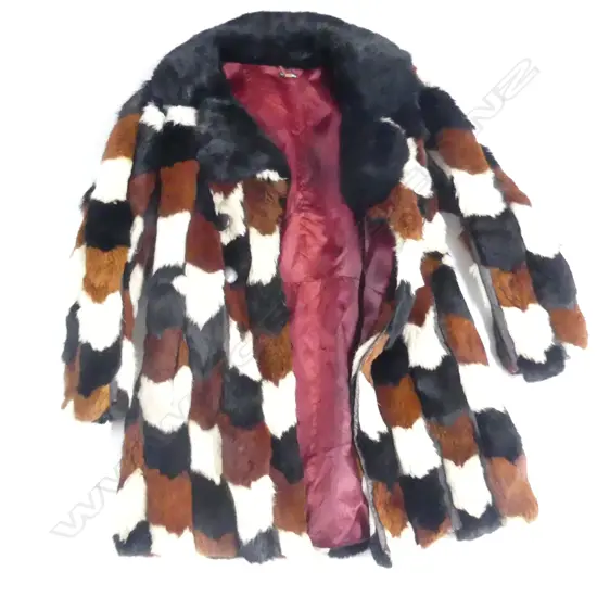 RABBIT FUR COAT ON MANNEQUIN