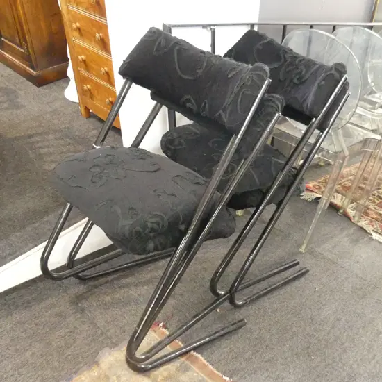 4 BLACK UPHOLSTERED CANTILEVER CHAIRS