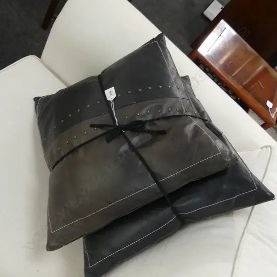 TWO LEATHER CUSHIONS