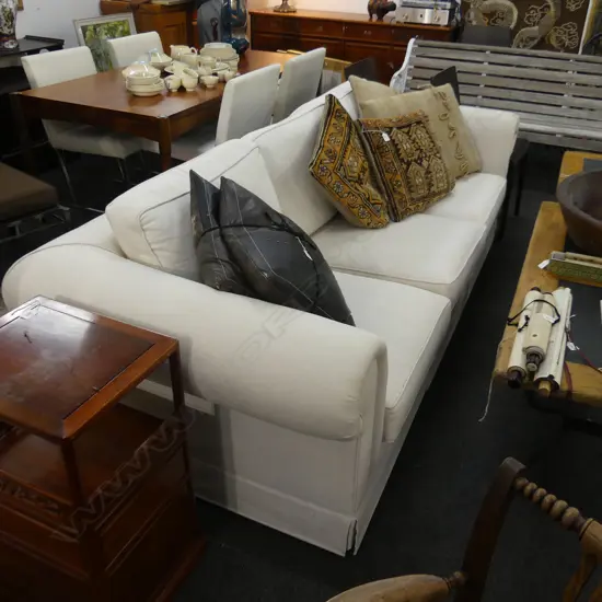 UPHOLSTERED CREAM COUCH 2200 x 900 x 700mm some marks