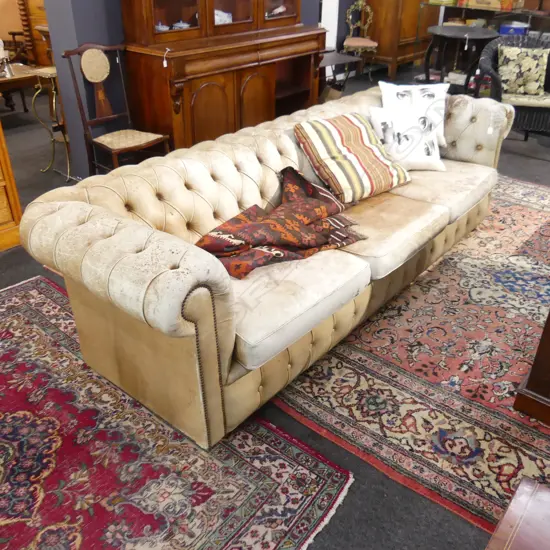 LEATHER BUTTONBACK CHESTERFIELD (sun damaged and some rips) 2400 x 900 x 700mm
