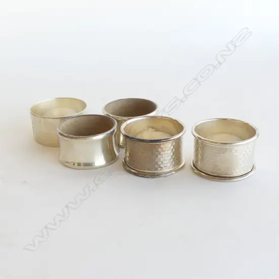 5 ASST STG SILVER NAPKIN RINGS 92GMS