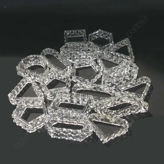 18 ASST SHAPED CUT CRYSTAL NAPKIN RINGS 