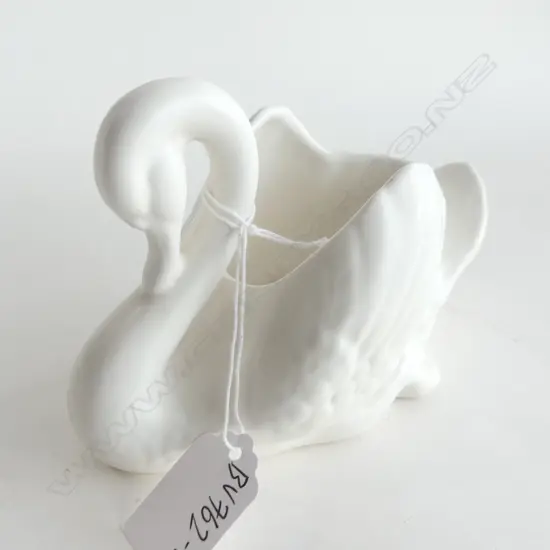 SMALL 'BABY' CROWN LYNN SWAN . PEARLY WHITE GLAZE. .154 IMPRESSED BACKSTAMP NO LOGO. L.150mm