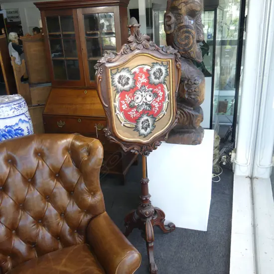 19TH C POLE SCREEN WALNUT CONSTRUCTION WITH BEADED DECORATION TO THE CARVED SHIELD