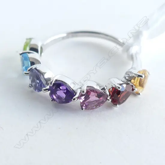 10CT GOLD RING SET WITH 7 ASST GEM STONES 2.0GMS