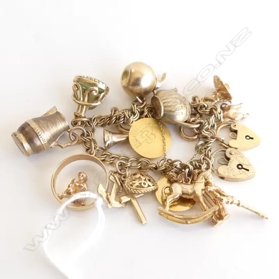 9CT GOLD CHARM BRACELET 47.4 GRAMS