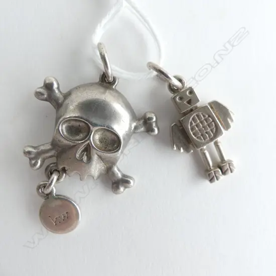 TWO STG SILVER KAREN WALKER PENDANTS SKULL AND ROBOT BUDGIE