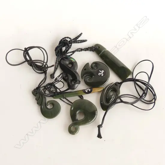 7 CARVED GREENSTONE MAORI PENDANTS