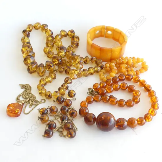1  AMBER NECKLACES + A BRACELET?   3 OTHER PLASTIC AMBER BEADS