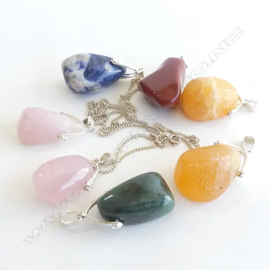 7 GEMSTONE PENDANTS; ROSE QUARTZ, CITRINE, JASPER, AGATE
