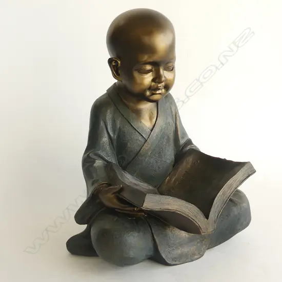 STATUE OF YOUNG BOY READING BUDDHA H. 300MM