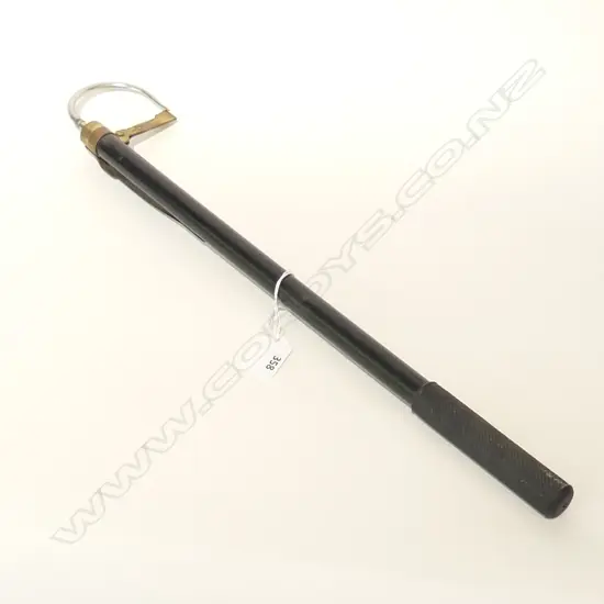 A vintage Hardy Bros. extendable fishing gaff extending from 20" to 44", blackened finish, alloy handle, brass belt clip and stainless keeper hook, maker's mark to brass fittings.