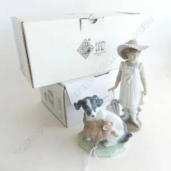 2 NAO FIGURES BOXED; GIRL w. PARASOL H. 190mm + CAT & DOG H.110mm