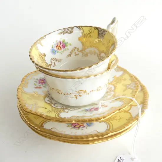 COALPORT YELLOW & GOLD PATTERN; 2 BATWING CUPS, SAUCER & 2 PLATES