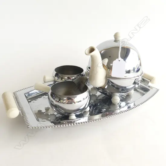 4 PCE DECO CHROME TEA SET; TEAPOT, JUG, SUGAR & TRAY W.350mm