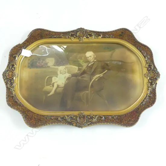 EARLY 20thC CONVEX GLAZED HAND COLOURED PHOTO; OLD GENT & GIRL 260x440mm
