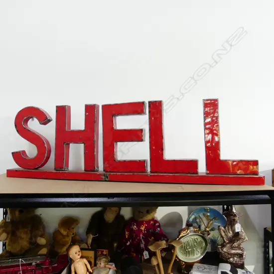 RED PAINTED METAL 'SHELL' SIGN L.1170mm