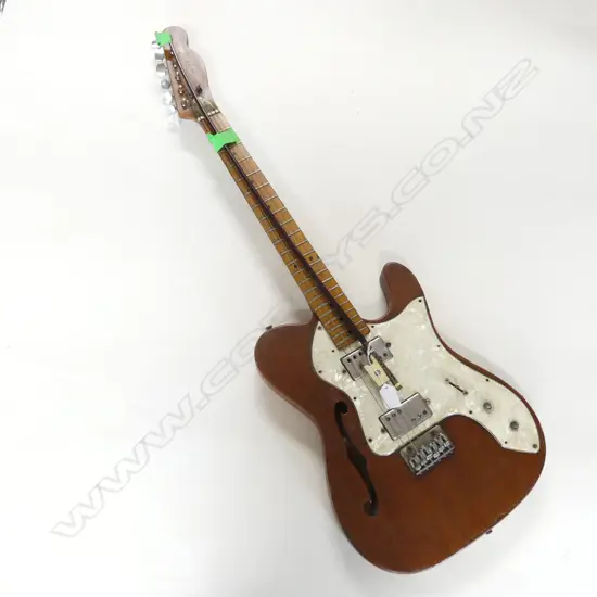 2 ITEMS. ELECTRIC GUITAR GIBSON NAME AT TOP IN A TELECASTER SHAPE & OLD VIOLIN BOW  WITH IVORY FROG WITH CHEVRON DETAIL