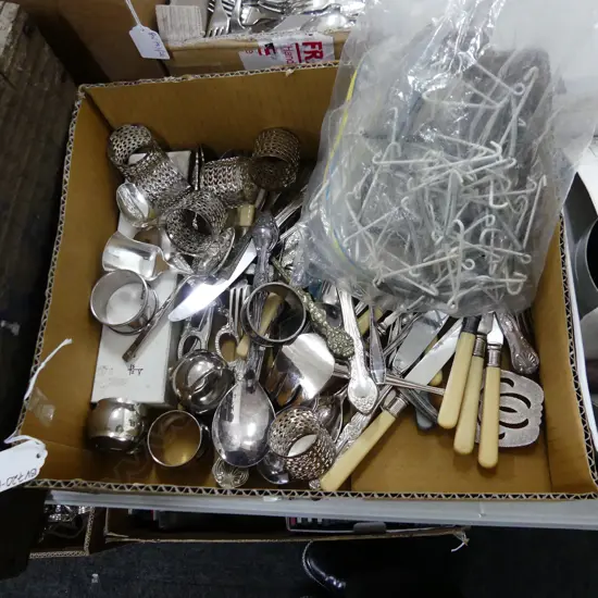 BOX ASST SILVER PLATE CUTLERY, NAPKIN RINGS ETC.. + BAG WIRE PLATE HANGERS 