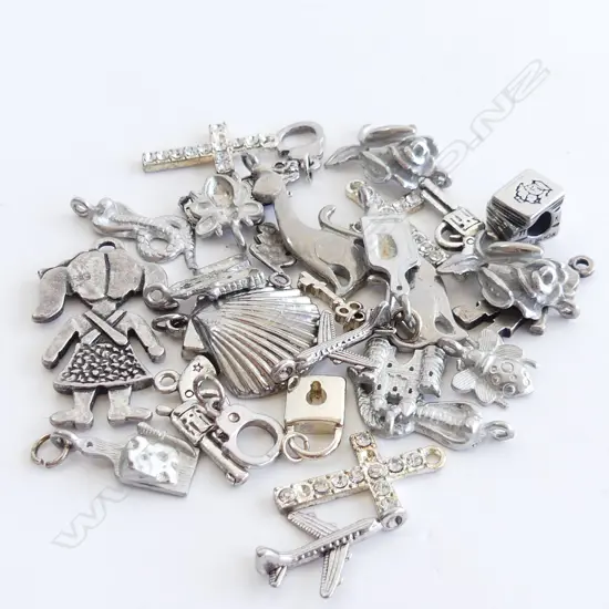 29 ASST CHARMS & PENDANTS, SOME STG