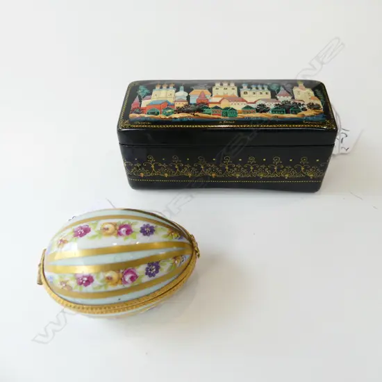 LIMOGES EGG SHAPED LIDDED TRINKET BOX (L70MM) + ARTISTS OF KHOLUI HAND PAINTED PAPER MACHE LACQUER BOX W CERT. (L 100MM)
