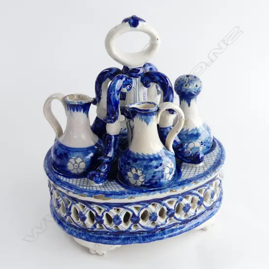 4 B/W CERAMIC CONDIMENTS (repairs) IN HOLDER H.240mm