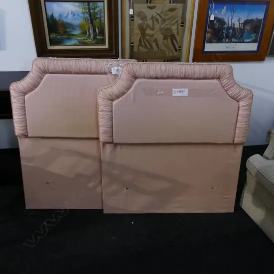 A PAIR OF PLUSH SILK? PADDED SINGLE BEDHEADS. SOFT PINK COLOURWAY. H 1050mm W. 900mm