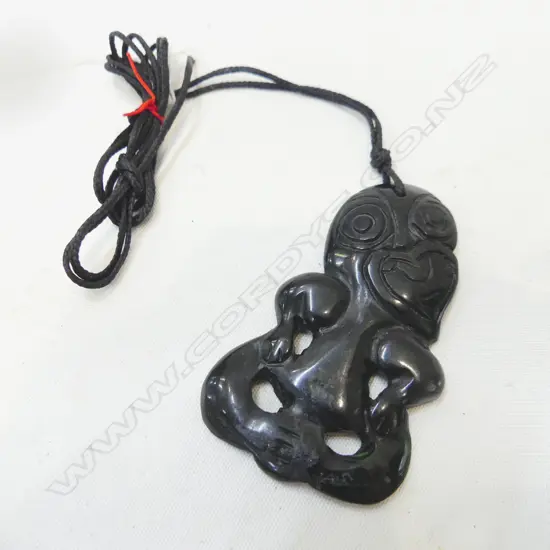 GREENSTONE TIKI PENDANT ON BLACK WAX CORD, L  65MM
