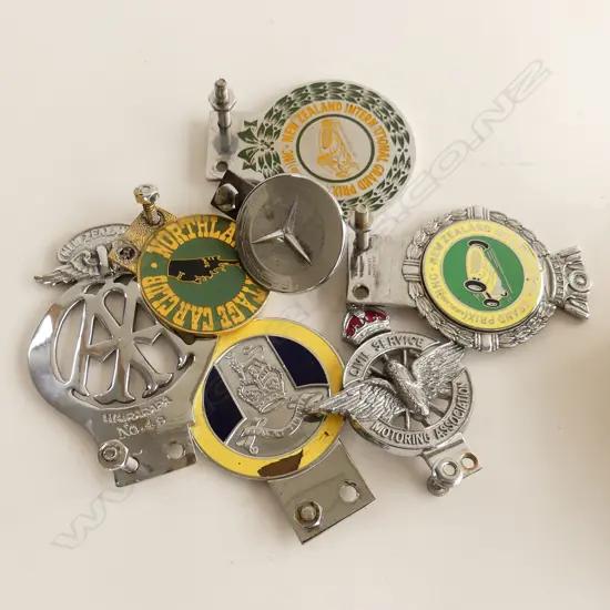 7 ASST. VINTAGE CAR BADGES; AA, 2x NZ GRAND PRIX ETC