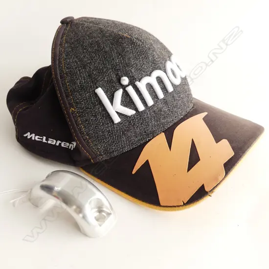 MCLAREN FI CAP (SIGNED, UNKNOWN) WITH MCLAREN F1 CAR PART WITH SERIAL NO. 