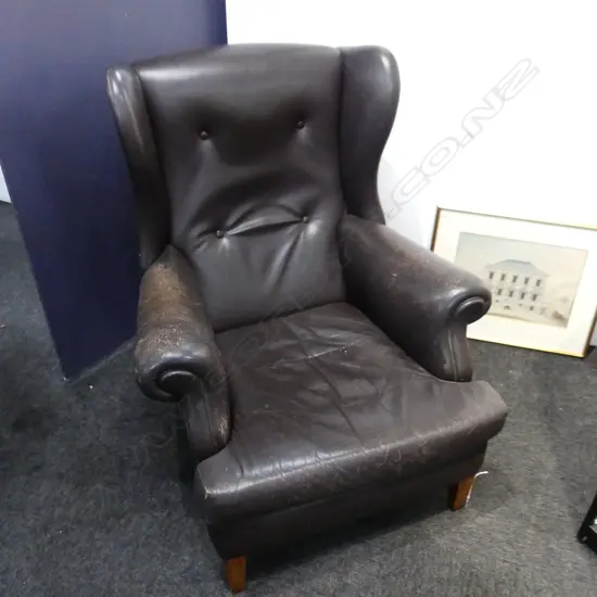 BROWN LEATHER WING BACK ARMCHAIR