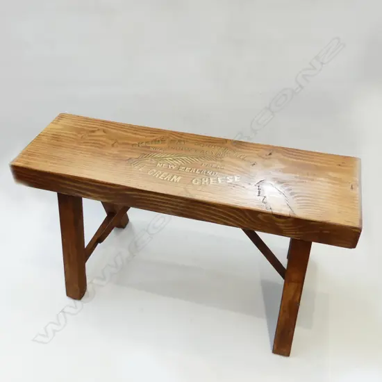 WOODEN STOOL STENCILLED ON SEAT 'OKAINS BAY CO-OPERATIVE DAIRY FACTORY'  WITH L 700MM