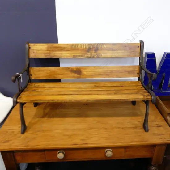 CHILD'S GARDEN BENCH SEAT, STENCILLED WITH 'MARTIN'S TOYS & HOBBIES, GLENFIELD'