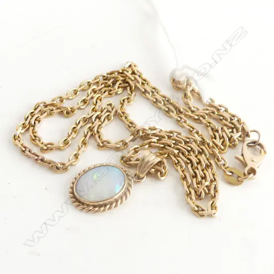 9CT GOLD & OPAL PENDANT ON CHAIN L.480mm 10.38gm the oval cabochon opal of good colour