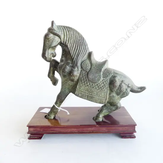 BRONZE TANG HORSE, RAISED ON ONE LEG, ON HARDWOOD STAND, L.230mm, H.210mm