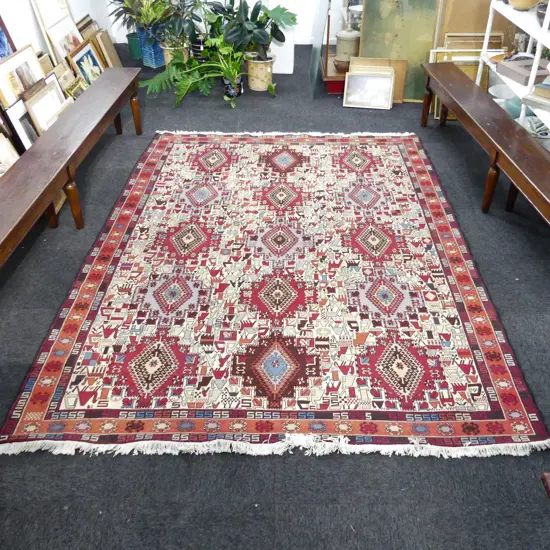 LGE KELIM HAND WOVEN RUG multiple animals & geometric forms 2900 x 2100mm. Signed Elham