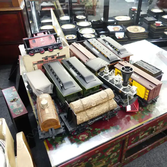 JIM BEAM TRAIN ENGINE & 11 ASST CARRIAGES. ALL 12  SEALED WITH CONTENTS