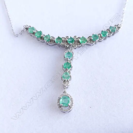 EMERALD, CRYSTAL &  925 SILVER NECKLACE, 13 EMERALDS. COMES WITH BOX 