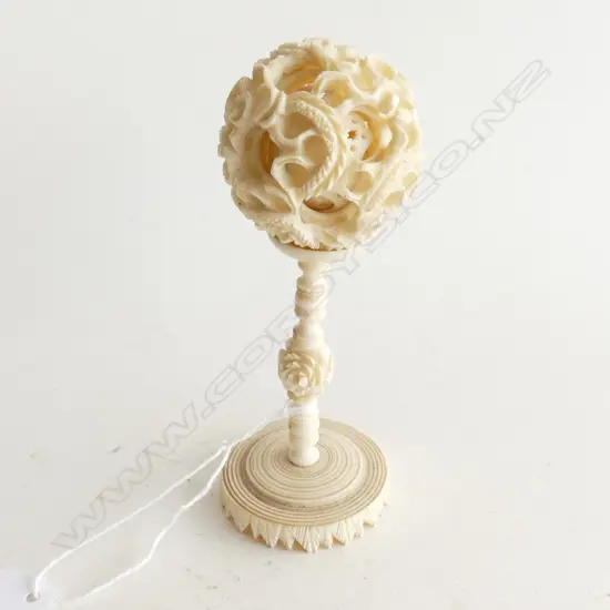 SMALL CARVED IVORY PUZZLE BALL ON STAND H 120 MM