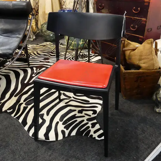 AN 'ACTIU' WING CHAIR. DESIGNED BY RAMOS BASSOLS.MADE IN SPAIN