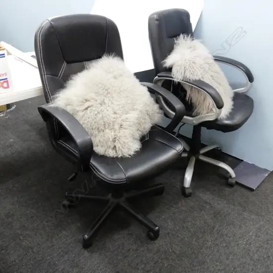 TWO BLACK OFFICE CHAIRS,  PADDED & WITH ARMS, HYDRAULICS SOMETIMES DEPRESS