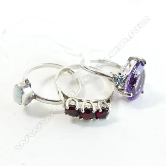 3 SILVER RINGS; FAUX OPAL, COLOURED STONES 6.8 GRAMS