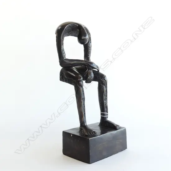 ABSTRACT BRONZE; SITTING MALE FIGURE ON STAND H.300mm