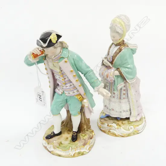 PR MEISSEN ANTIQUE PORCELAIN FIGURES; MAN IN TRICORNE HAT (1 HAND w. DAMAGE) + LADY w. MUFF H.200mm
